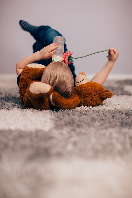 child on carpet